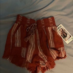 New shorts , striped , red